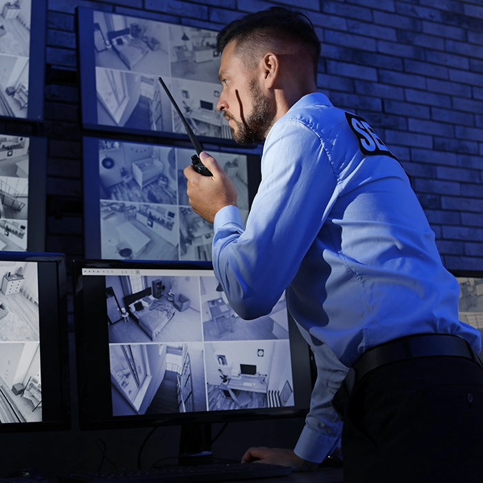Closeup of man holding gun pointed at target